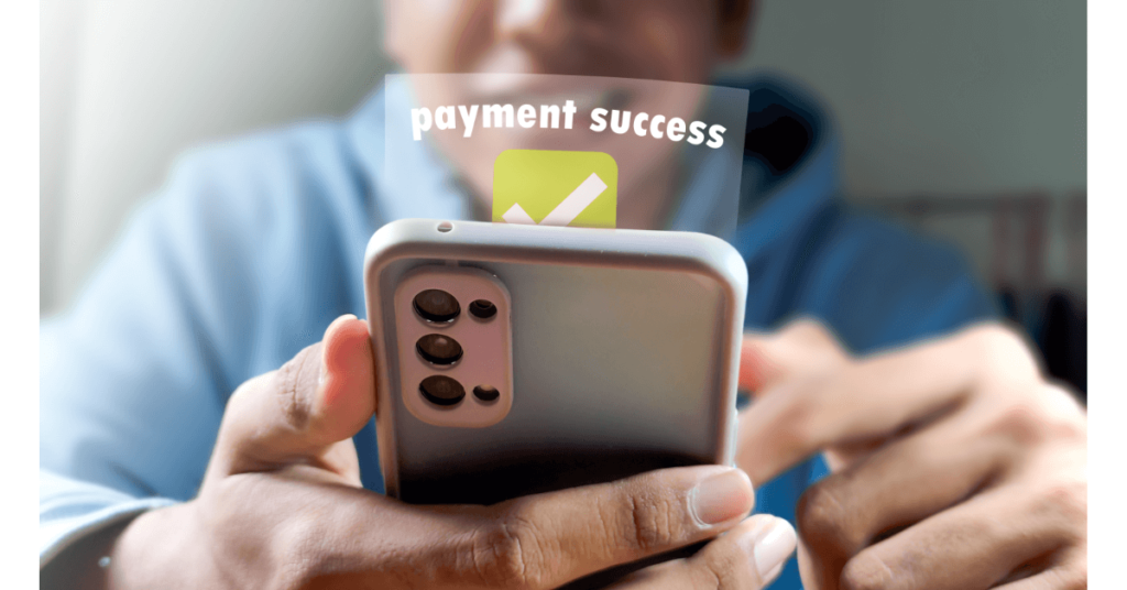 Man making a successful mobile phone payment